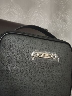 Guess Black Embossed Logo Cosmetic Case with Silver Plaque